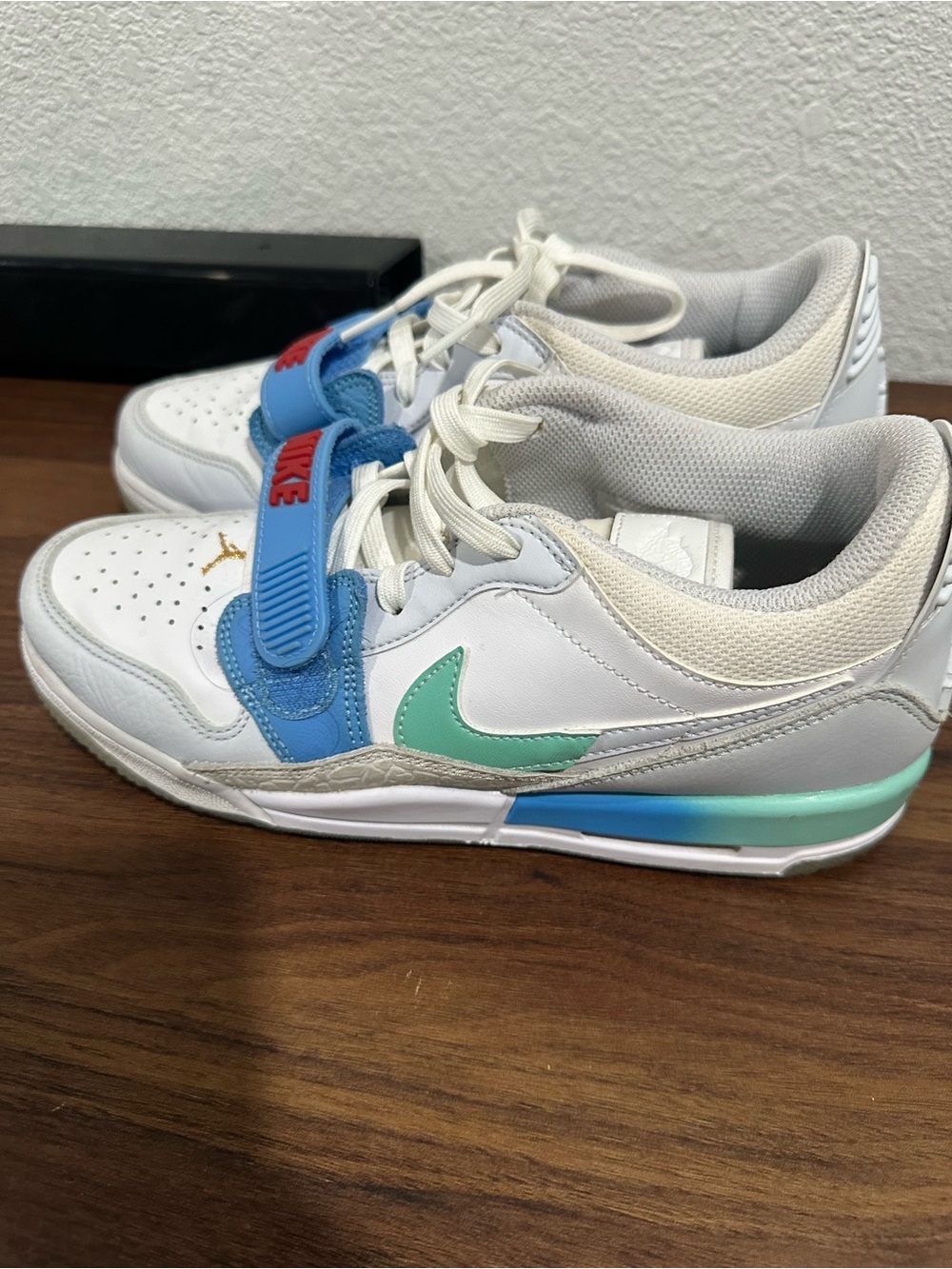 Jordan Kids' White Sneakers with Teal Swoosh and Blue Strap